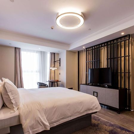 Howard Johnson By Wyndham Life Zhuoyuan Нинбо Экстерьер фото